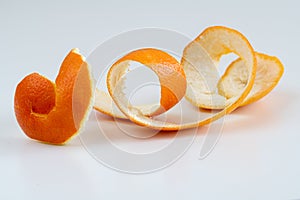 Spiral orange peel isolated on white background