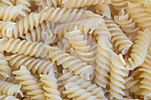 Spiral raw pasta background