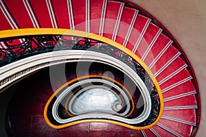 Spiral red downward staircase