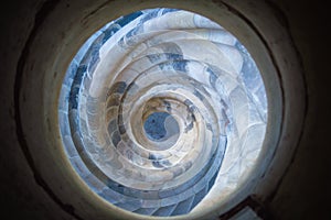 Spiral shape of a stone staircase in Hartenfels Castle, Germany