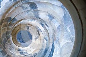 Spiral shape of a stone staircase in Hartenfels Castle, Germany