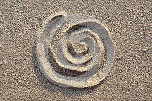 Spiral sign in sand