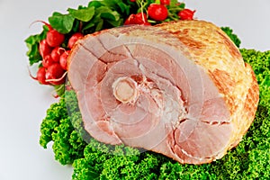 Spiral sliced hickory smoked ham with fresh herb and radish