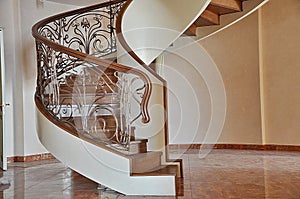 Spiral spiral staircase inside the house.