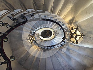 a spiral stair case in a castle