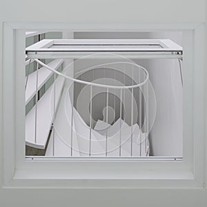 Spiral stair through the window