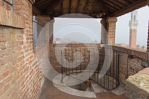 Spiral staircase down from the Facciatone, Siena, Tuscany. Italy.