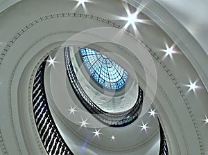 Spiral staircase with glass atrium