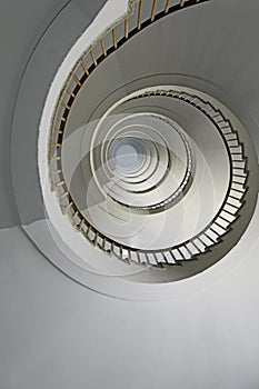 spiral staircase going up vertically without people