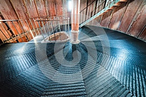 A spiral staircase inside a lighthouse.