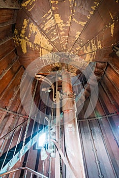 A spiral staircase inside a lighthouse.