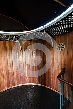 A spiral staircase inside a lighthouse.