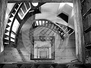 Spiral staircase in the old lighthouse in black and white