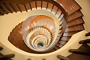 Spiral staircase, steep descent down the stairs