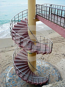 Spiral staircases on the beach of the bay of Cadiz, Andalusia. Spain.