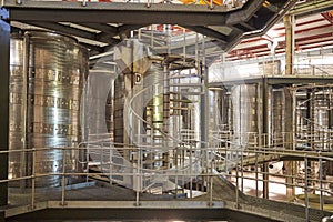 Spiral stairs in a modern winemaking facility interior