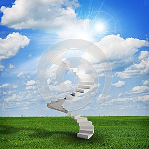 Spiral stairs in sky with green grass, clouds and