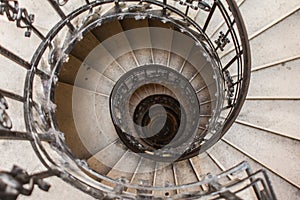 Spiral stone staircase in the tower of St. Stephen`s Cathedral. Budapest is the capital of Hungary