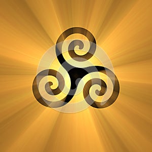 Spiral symbol Triskelion with light flare