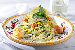 Spiral vegetable pasta on a fancy plate