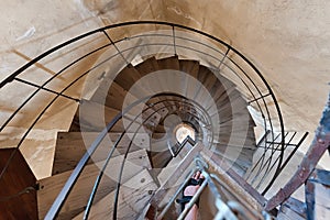 The spiral wooden stairs