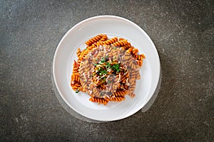 Spirali or spiral pasta with tomato sauce