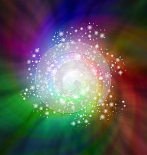 Spiraling Sparkles rotating on dark colored background photo