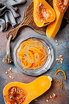 Spiralized butternut squash spaghetti. Low carb vegetable pasta cooking.