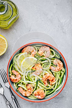 Spiralized zucchini noodles pasta with shrimps. Top view