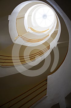Spiralling stairs and skylight photo