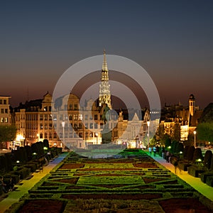 The spire of Brussels Town Hall on Grand Place is seen on the horizon, photographed from above the Mont des Arts park