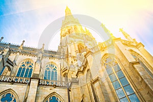 Spire of the New Dome gothic cathedral in Linz Austria. Low angle perspective. Blue sky golden sunlight. Close up