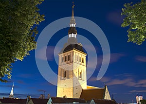 The spire of St. Nicholas ' Church closeup summer night. Tallinn, Estonia