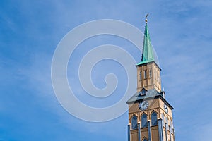 Spire of Tromso¸ Cathedral over blue sky