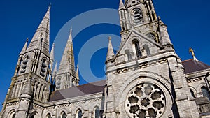 The spires of the Anglican Cathedral of St. Fin Barre in the Irish city of Cork. A Christian church in the Neo-Gothic style.