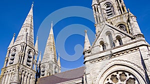 The spires of the Anglican Cathedral of St. Fin Barre in the Irish city of Cork. A Christian church in the Neo-Gothic style.