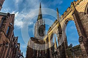 The spires and arches of the ruins of St Michaels Cathedral in Coventry, UK