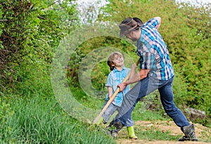 Spirit of adventures. Adventure hunting for treasures. Little helper in garden. Cute child in nature having fun cowboy