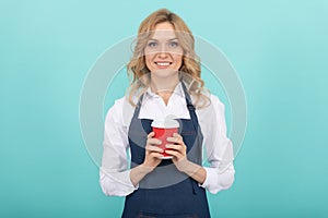 Spirit of Expertise. cheerful girl drinking tea. woman in apron with plastic cup. good morning