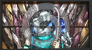 Spirit of God awakens a new life, both dead and alive, stained glass window in church of St John in Piflas, Germany