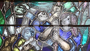 Spirit of God awakens a new life, both dead and alive, stained glass window in church of St John in Piflas, Germany