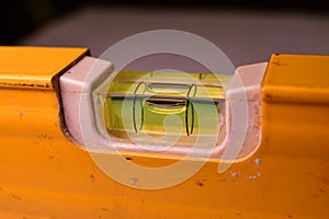 spirit level ruler yellow precision bubble close up