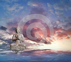 Spiritual background for meditation with buddha statue and clouds sky