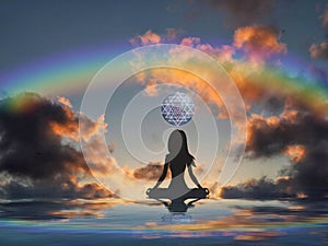 Spiritual background for meditation with human silhouette with rainbow in sea reflection