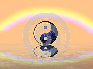 Spiritual background for meditation with yin yang symbol and rainbow in sea reflection