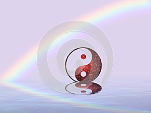 Spiritual background for meditation with yin yang symbol and rainbow in sea reflection