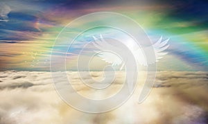 Spiritual guidance, Angel of light and love doing a miracle on sky, rainbow angelic wings