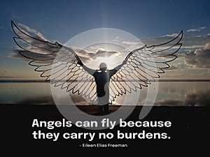 Spiritual inspirational motivational quote - Angels can fly because they carry no burdens. With angel silhouette with wings.