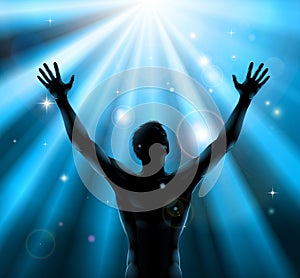 Spiritual man with arms raised up concept