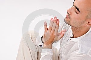 Spiritual man praying and meditating.